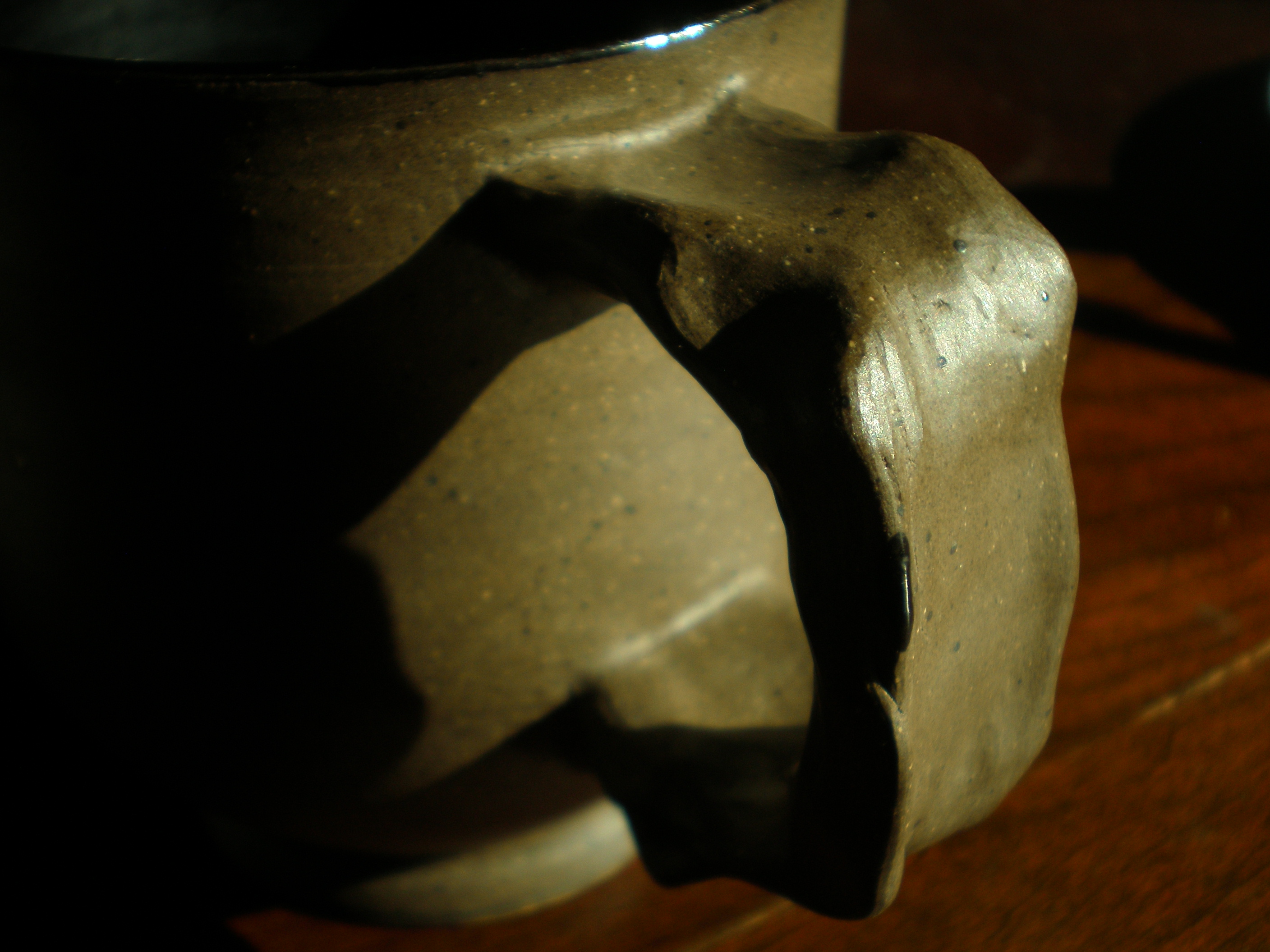 A new mug with a biomorphic handle.